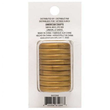 DISCOS PARA PLANNER DORADOS 1.25" WE R MEMORY KEEPERS (9 PCS)